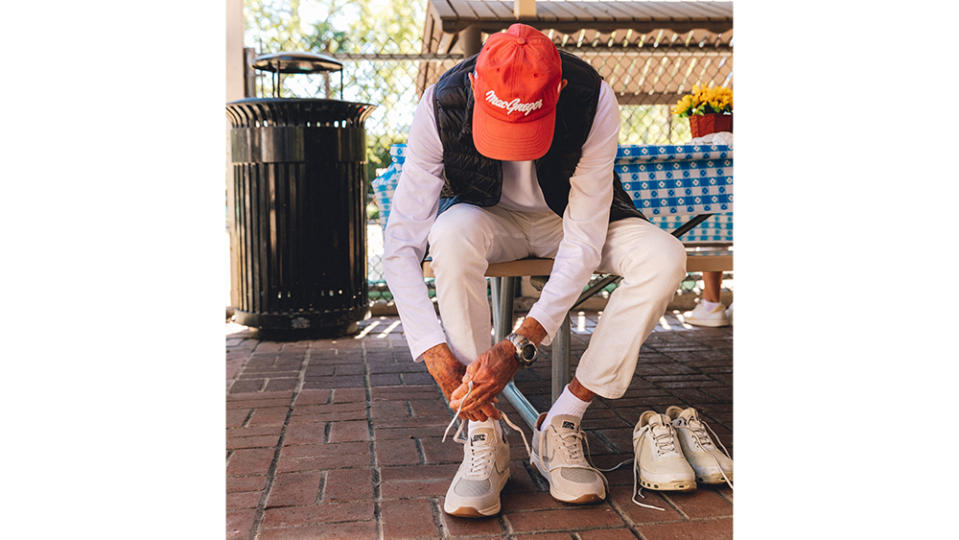 Model putting on Duke & Dexter sneakers.