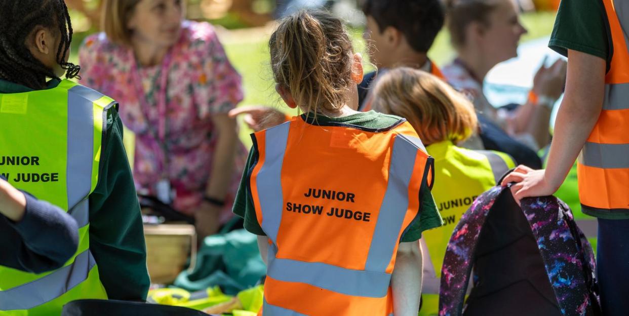 children at the chelsea flower show who have been judging the gardens