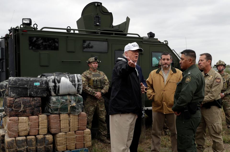 President Donald Trump tours the U.S. border with Mexico at the Rio Grande on the southern border, Thursday, Jan. 10, 2019, in McAllen, Texas. (AP Photo/ Evan Vucci)