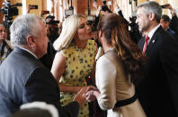 Ivanka Trump, President Donald Trump's daughter and White House adviser, greets first lady Silvana Lopez Moreira, at Presidential Palace in Asuncion, Paraguay, Friday, Sept. 6, 2019. Ivanka Trump is on her third stop of a South American trip to promote women's empowerment. Also pictured are U.S. Deputy Secretary of State John J. Sullivan, left, and Paraguay's President Mario Abdo Benitez, right. (AP Photo/Jorge Saenz)
