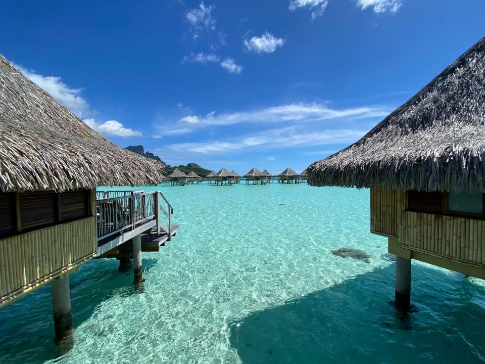 The view of the lagoon from overwater bungalows at the InterContinental Bora Bora Le Moana Resort.