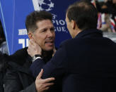 Juventus coach Massimiliano Allegri and Atletico coach Diego Simeone speak ahead of the Champions League round of 16 first leg soccer match between Atletico Madrid and Juventus at Wanda Metropolitano stadium in Madrid, Wednesday, Feb. 20, 2019. (AP Photo/Andrea Comas)