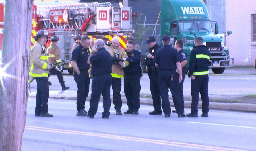 Smoke exiting the back of a semi-truck trailer has caused the evacuation of an area in North Franklinton. (NBC4/Ronald Clark)