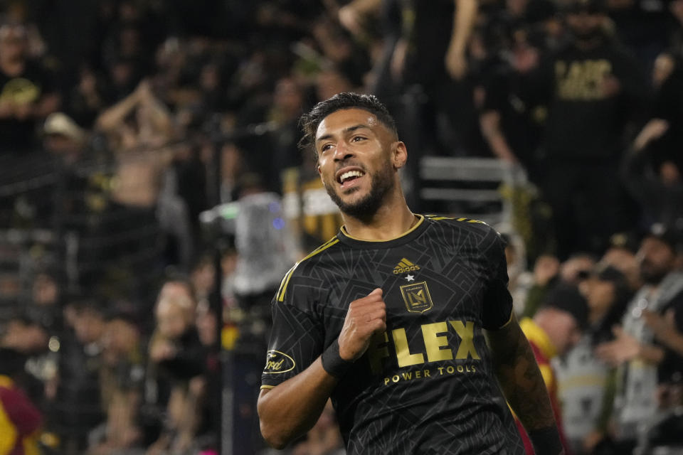 Los Angeles FC forward Denis Bouanga smiles during the second half in the MLS playoff Western Conference final soccer match against Houston Dynamo, Saturday, Dec. 2, 2023, in Los Angeles. (AP Photo/Marcio Jose Sanchez)