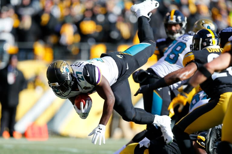 Leonard Fournette of the Jacksonville Jaguars dives into the endzone for a touchdown against the Pittsburgh Steelers