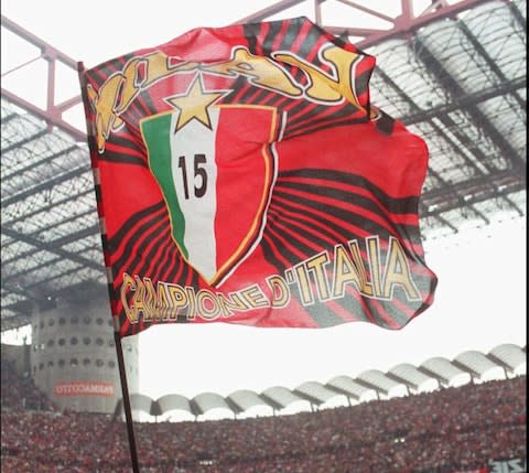 A flag celebrating AC Milan's victories - Credit: AP