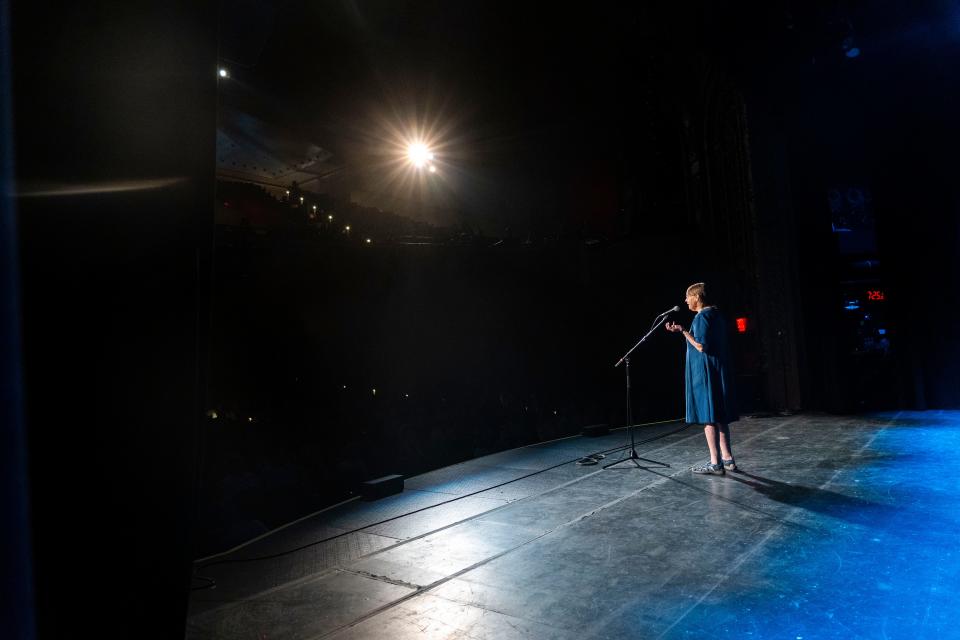 Monica Leo tells a story during the Des Moines Storytellers Project's "Travel" show at Hoyt Sherman Place on Tuesday, June 20, 2023, in Des Moines.