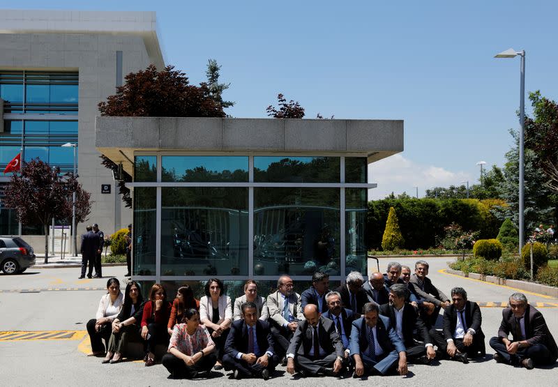 Pro-Kurdish HDP lawmakers hold a sit-in to protest against detention of lawmakers outside the Constitutional Court in Ankara