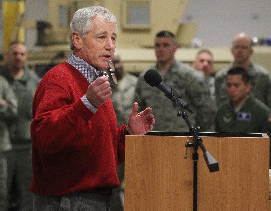 Defense Secretary Chuck Hagel speaks with airmen of the 20th Air Force 90th Missile Wing during a trip to F.E. Warren Air Force Base on Thursday, Jan. 9, 2014 in Cheyenne, Wyo. It was the first time since 1982 that a defense secretary has visited the nuclear missile base. (AP Photo/Wyoming Tribune Eagle, Blaine McCartney)