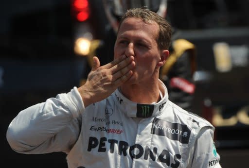 German driver Michael Schumacher blows a kiss to the crowd after the qualifying session for the Monaco Grand Prix. Schumacher rolled back the years on Saturday with the fastest lap in qualifying for Sunday's Monaco Grand Prix, although Australian Red Bull driver Mark Webber will start the race from pole position