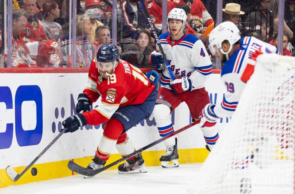 Florida Panthers left wing Matthew Tkachuk (19) competes for the puck against New York Rangers defenseman K’Andre Miller (79) in the third period of Game 4 during the Eastern Conference finals of the NHL hockey Stanley Cup playoffs at the Amerant Bank Arena on Tuesday, May 28, 2024, in Sunrise, Fla.