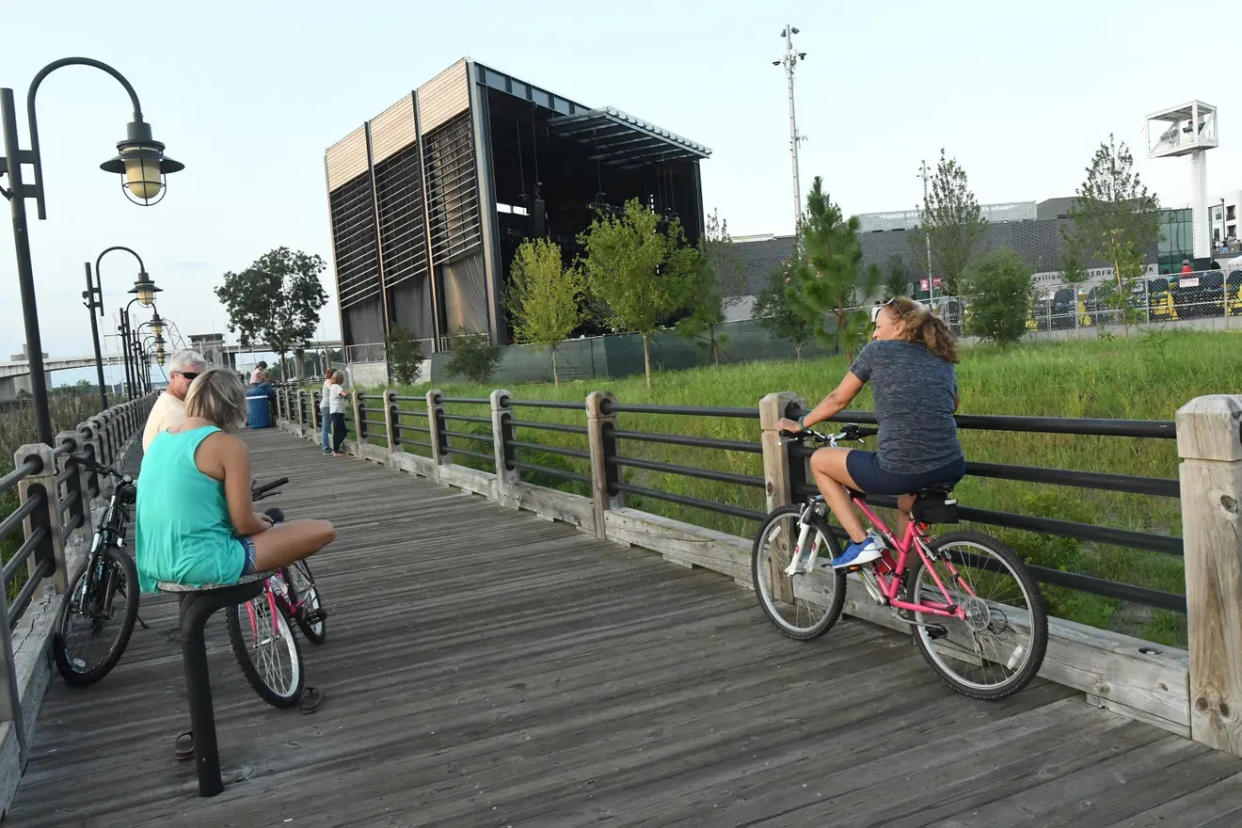 Places such as the Wilmington Riverwalk are noted in the book "100 Things to Do in Wilmington, North Carolina Before You Die."