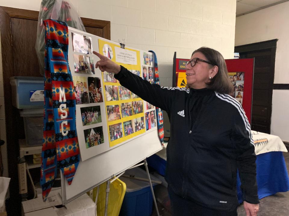 Dorene Wiese, president of the American Indian Association of Illinois and citizen of the Minnesota White Earth band of Ojibwe Indians, shares photos from an inter-tribal powwow at her community center in Chicago.