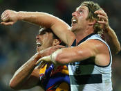 Muscle up: Scott Lycett and Dawsom Simpson battle for the ball