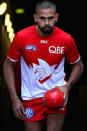 <p>Lewis Jetta emerges for the Swans' warm-up.</p>