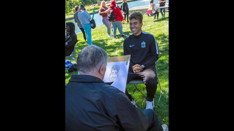 Trailblazers soccer player Eduardo Rodrigues sits for a caricaturist during Fall Fest 2022 on L&C’s Godfrey Campus. While Fall Fest is for L&C students, Summerfest will offer a similar experience for the entire community from 4-6 p.m., Thursday, July 13.