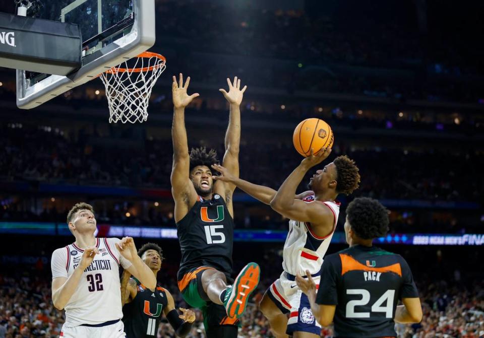 Connecticut Huskies guard Nahiem Alleyne (4) goes to the basket against Miami Hurricanes forward Norchad Omier (15) during the first half of the Men’s Basketball Championship National Semifinal at NRG Stadium in Houston, Texas on Saturday, April 1, 2003.