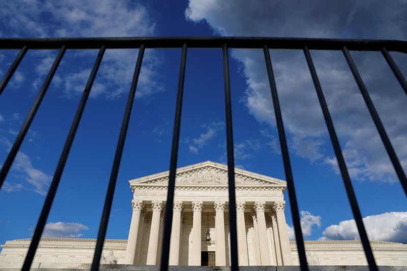 FILE PHOTO: Fencing is seen in front of the United States Supreme Court Building in Washington, D.C.