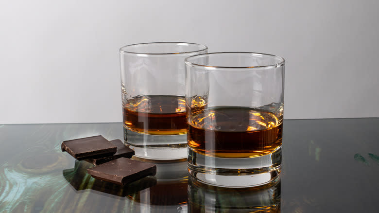 Glasses of whiskey with chocolate