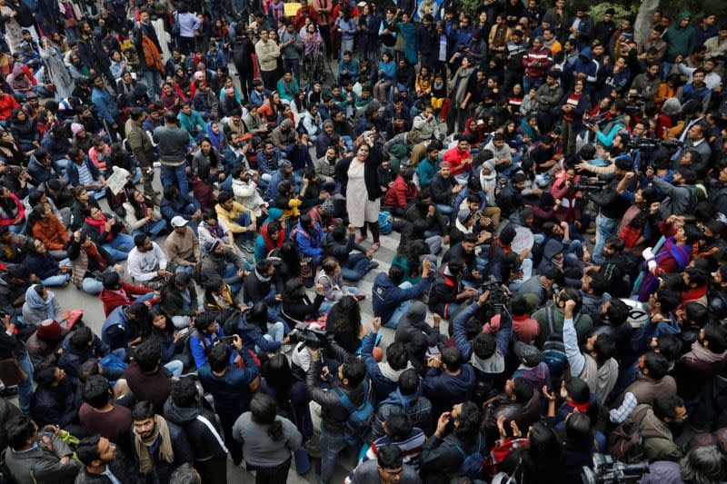 Demonstrators attend a protest against the attacks on students of Jawaharlal Nehru University (JNU) on Sunday, on the university campus in New Delhi