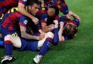 FC Barcelona v Bayern Munich - UEFA Champions League Semi Final First Leg - The Nou Camp, Barcelona, Spain - 6/5/15 Barcelona's Lionel Messi celebrates with team mates after scoring their second goal Reuters / Gustau Nacarino