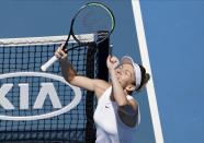 Romania's Simona Halep celebrates after defeating Belgium's Elise Mertens in their fourth round singles match at the Australian Open tennis championship in Melbourne, Australia, Monday, Jan. 27, 2020. (AP Photo/Lee Jin-man)