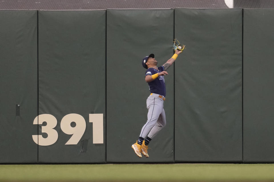 Tampa Bay Rays center fielder Jose Siri catches a fly ball hit by San Francisco Giants' Brandon Crawford during the third inning of a baseball game in San Francisco, Tuesday, Aug. 15, 2023. (AP Photo/Jeff Chiu)