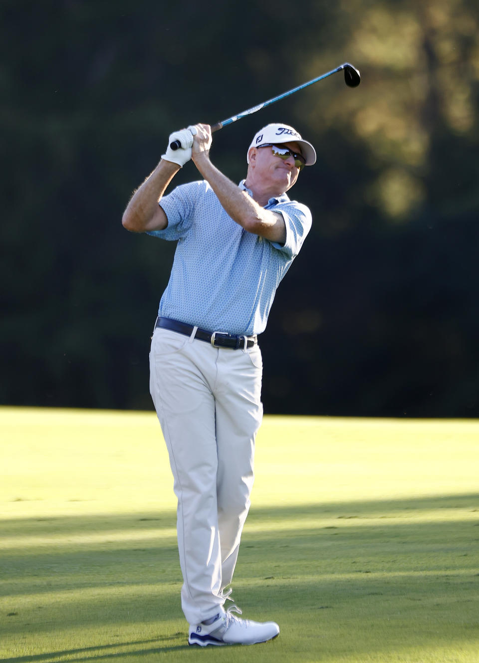 Steve Flesch looks on his second shot at the 18th hole during the second day of the Dominion Energy Charity Classic golf tournament at Country Club of Virginia on Saturday, Oct. 23, 2021, in Richmond, Va. (Daniel Sangjib Min/Richmond Times-Dispatch via AP)