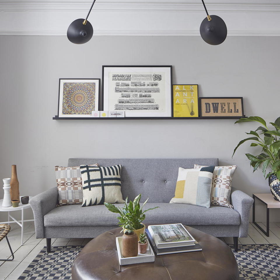 Warm up grey walls with bright prints