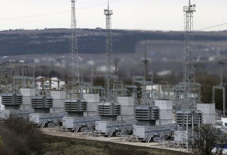 A general view shows the facilities of a mobile gas turbine generator, which was turned on due to power outages after pylons carrying electricity were blown up, in the settlement of Stroganovka, Simferopol district of Crimea, in this November 22, 2015 file photo. REUTERS/Pavel Rebrov
