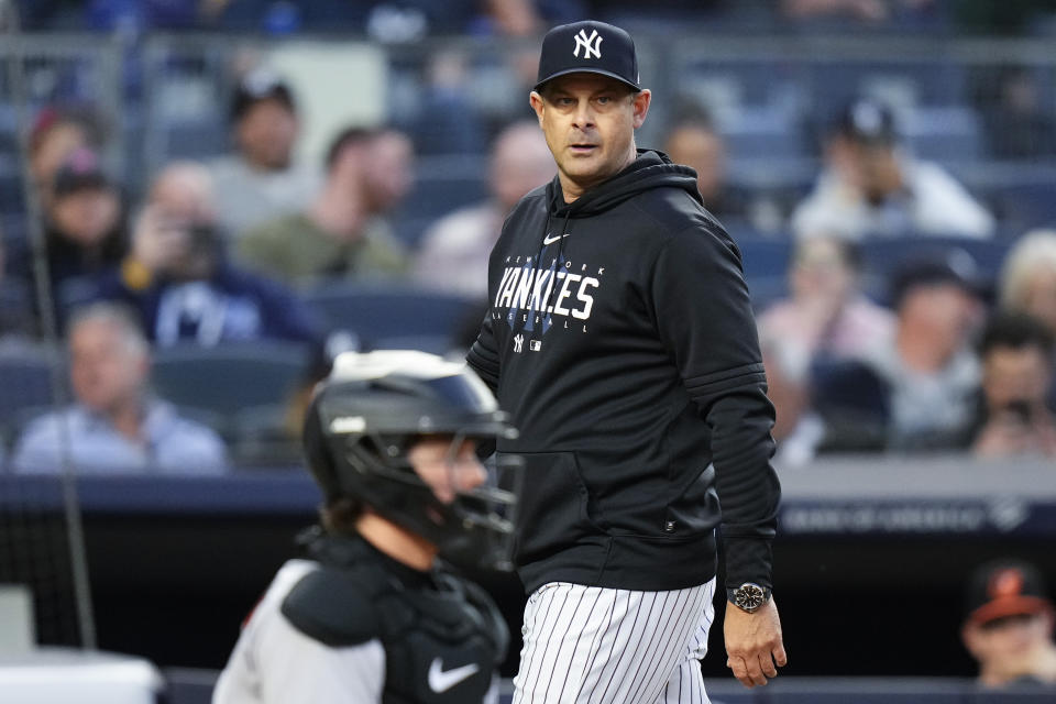 New York Yankees manager Aaron Boone leaves the field after being ejected during the third inning of the team's baseball game against the Baltimore Orioles on Thursday, May 25, 2023, in New York. (AP Photo/Frank Franklin II)