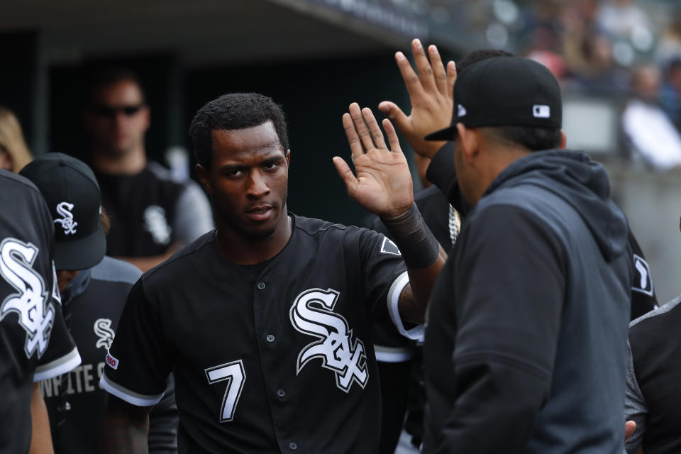 Chicago White Sox's Tim Anderson (7) celebrates scoring against the Detroit Tigers in the sixth inning of a baseball game in Detroit, Thursday, April 18, 2019. (AP Photo/Paul Sancya)