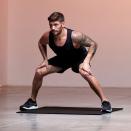 <p>In a low squat with your toes turned out around 30 degrees, use your trail arm and plant your hands down on the floor and shift your body to meet them. Get back into your squat position, and repeat on the other side. For a low-impact option, step it out.</p>