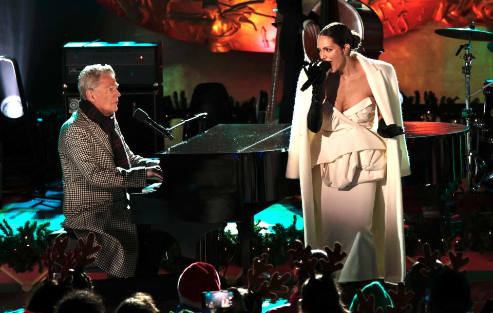 David Foster and Katharine McPhee perform during the Christmas Tree Lighting ceremony at Rockefeller Plaza on Nov, 30, 2022, in New York City.