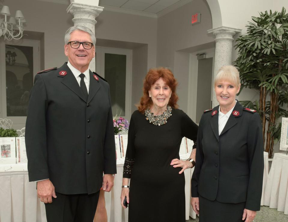 Maj. James Hall, Gail Levine and Maj. Leisa Hall at the Salvation Army "Hearts of Gold" luncheon in 2020. This year's luncheon is March 14 at The Beach Club.