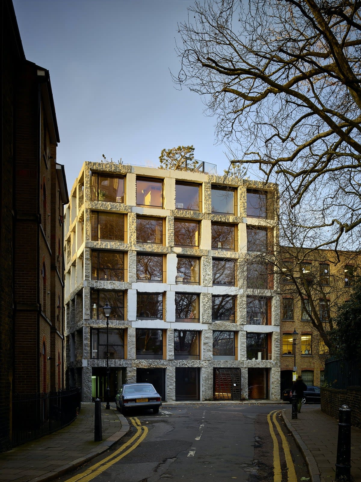 Taha lives in a four-bedroom eco flat at the top of the building (Compton)