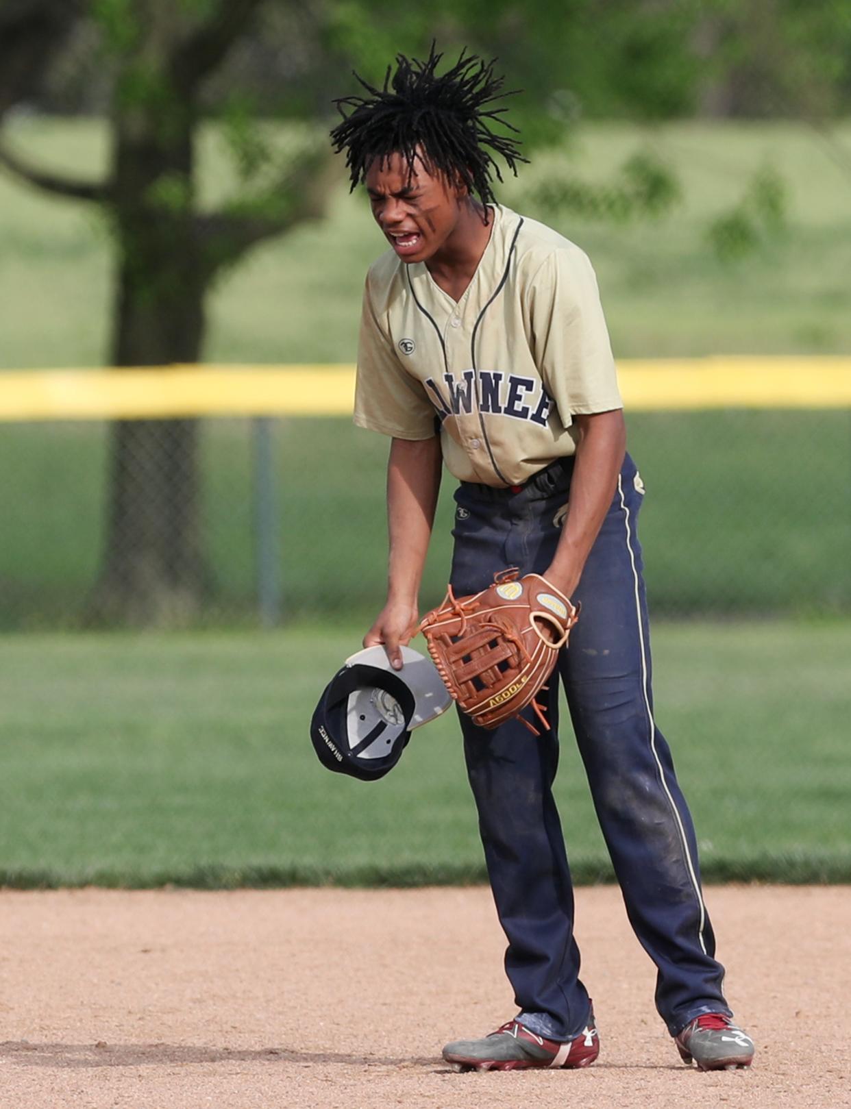 Shawnee’s Jeremiah Forrest celebrates after striking out a Francis Parker batter.