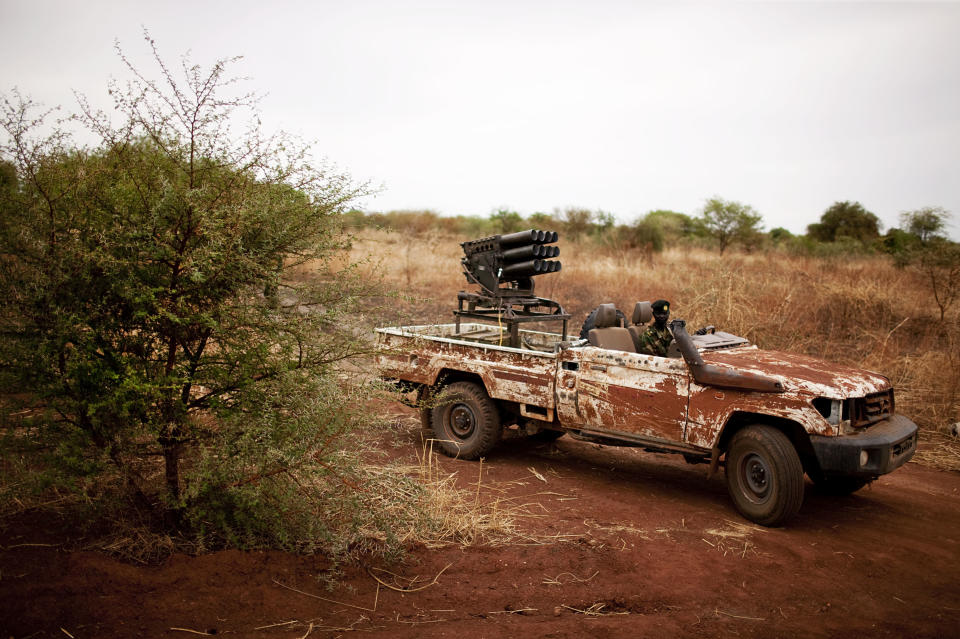 A Sudan People's Liberation Army vehicle at a frontline position in Tachuin, South Sudan on Friday May 11, 2011. In late April, tensions between Sudan and South Sudan erupted into armed conflict along their poorly defined border. Thousands of SPLA forces have been deployed to Unity State where the two armies are at a tense stalemate around the state's expansive oil fields. Fighting between the armies lulled in early May after the U.N. Security Council ordered the countries to resume negotiations. South Sudan seceded from the Republic of Sudan in July 2011 following decades of civil war. (AP Photo/Pete Muller)