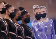 <p>Simone Biles of Team United States (center) wears a mask during Women's Podium Training ahead of the Tokyo 2020 Olympic Games at Ariake Gymnastics Centre on July 22, 2021 in Tokyo, Japan. (Photo by Ezra Shaw/Getty Images)</p> 