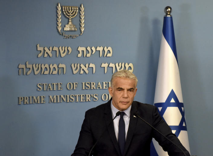 Israeli Prime Minister Yair Lapid speaks about Iran at a security briefing for the foreign press at the prime minister's office in Jerusalem, Wednesday, Aug. 24, 2022. Lapid on Wednesday called on U.S. President Joe Biden and Western powers to call off an emerging nuclear deal with Iran, saying that they are letting Tehran manipulate the terms and that an agreement would reward Israel's enemies. He called the emerging agreement a “bad deal” and suggested that Biden has failed to honor red lines he had previously promised to set. (Debbie Hill/Pool via AP)