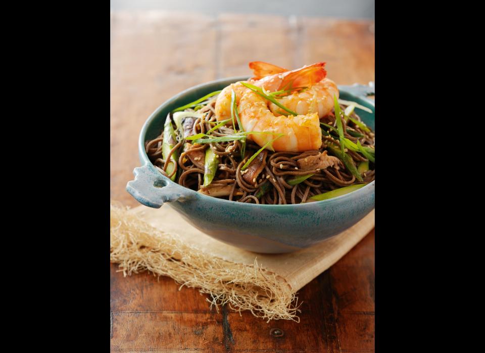 <strong>Get the <a href="http://www.huffingtonpost.com/2011/12/15/olive-oil-poached-shrimp-_n_1151645.html" target="_hplink">Olive Oil-Poached Shrimp with Soba Noodles recipe</a></strong>