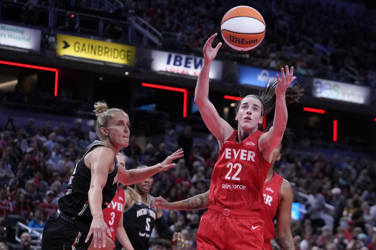 Caitlin Clark becomes first WNBA rookie to record triple-double as Fever come back to beat Liberty