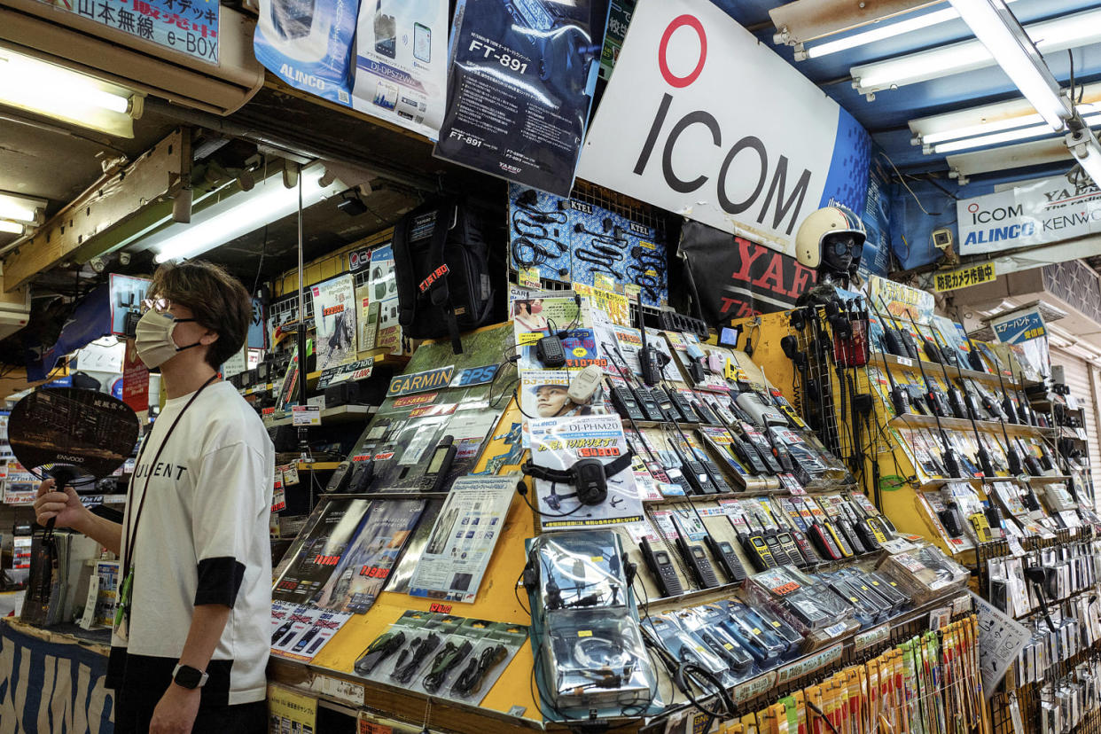 A sign with the logo of Japanese walkie-talkie maker Icom (C, top) is displayed at a shop that specialises in wireless devices in Tokyo's Akihabara electric district on September 19, 2024. (Kazuhiro Nogi / AFP - Getty Images)