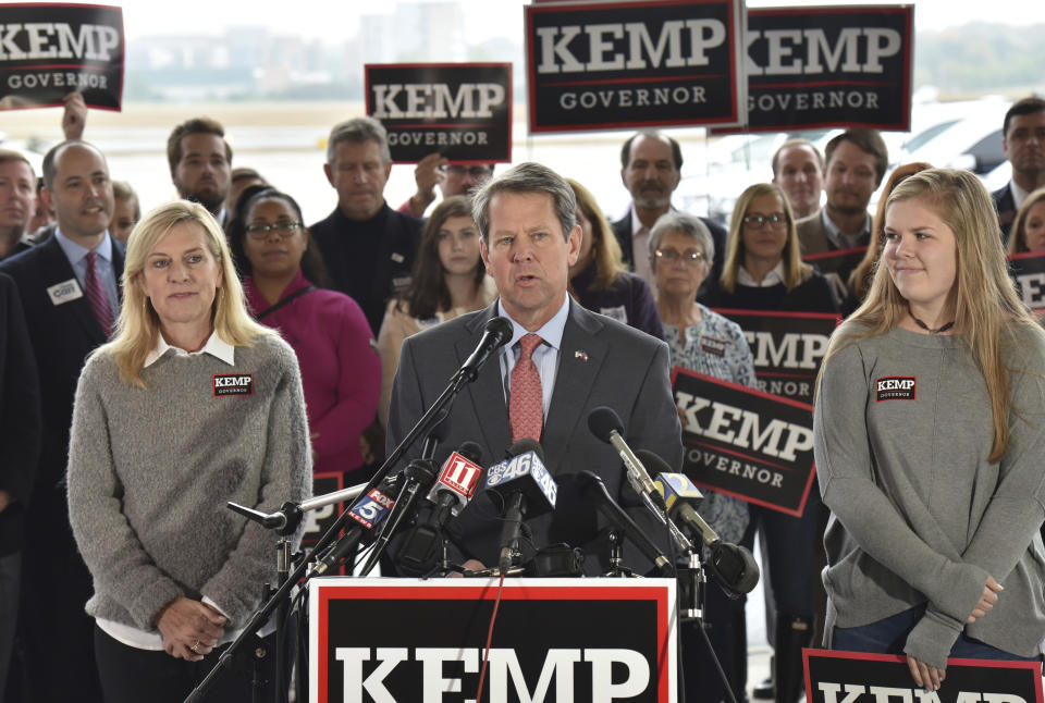 Georgia Republican gubernatorial candidate Brian Kemp speaks during a campaign stop at Peachtree DeKalb Airport on Monday, Nov. 5, 2018. (Hyosub Shin/Atlanta Journal-Constitution via AP)