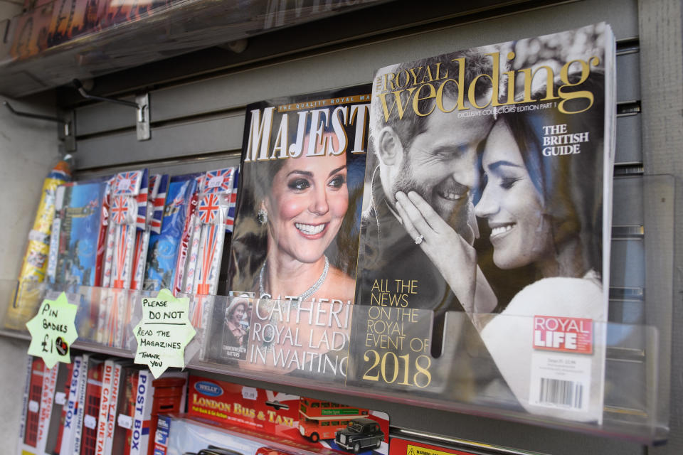 LONDON, ENGLAND - MARCH 29:  A magazine featuring an image of Prince Harry and Meghan Markle is seen on a trader's stall near Buckingham Palace on March 29, 2018 in London, England.  Their wedding is set to place at Windsor Castle on 19 May and gift shops are preparing for the event with memorabilia of all types.  (Photo by Leon Neal/Getty Images)