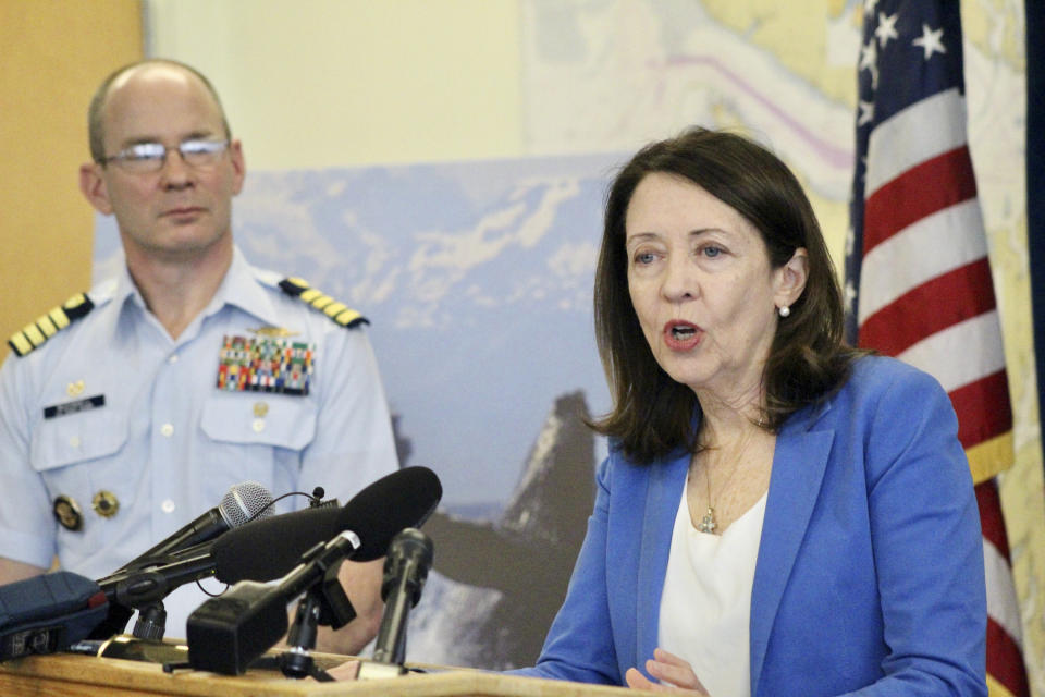 U.S. Sen. Maria Cantwell, D-Wash., speaks at a press conference while U.S. Coast Guard Captain Mark McDonnell, Sector Puget Sound Commander, looks on in Seattle, Wednesday, Feb. 21, 2024. The U.S. Coast Guard is launching a whale alert program, which Woodbridge is managing, in Washington's Salish Sea to help commercial and transit ships steer clear of the marine mammals. (AP Photo/Manuel Valdes)