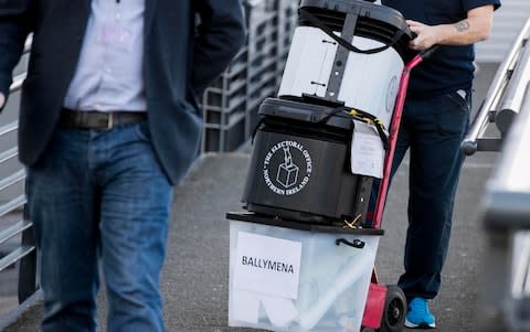 Petition boxes are collected in Ballymena on the final day of a recall petition triggered by Ian Paisley's suspension from the House of Commons - Credit: Liam McBurney /PA