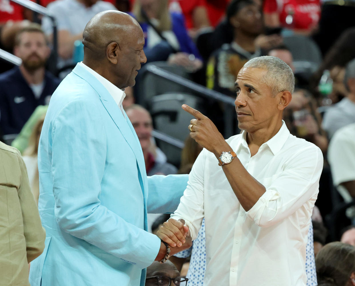 President Obama chats with NBA Hall of Famer Spencer Haywood. (Ethan Miller/Getty Images)