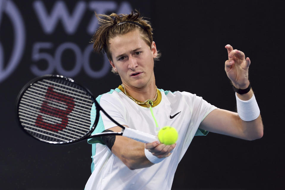 Sebastian Korda of the U.S. plays a shot in his match against Yannick Hanfmann of Germany during the Brisbane International tennis tournament in Brisbane, Australia, Tuesday, Jan. 2, 2024. (AP Photo/Tertius Pickard)