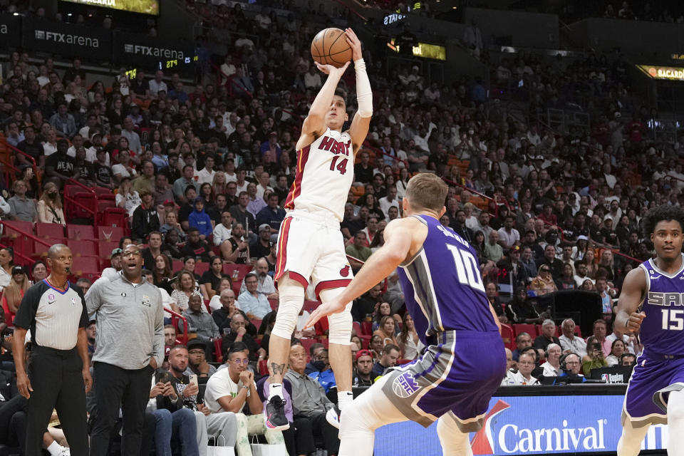 MIAMI, FL - NOVEMBER 02: Tyler Herro #14 of the Miami Heat puts up a shot during the second half against the Sacramento Kings at FTX Arena on November 2, 2022 in Miami, Florida. NOTE TO USER: User expressly acknowledges and agrees that,  by downloading and or using this photograph,  User is consenting to the terms and conditions of the Getty Images License Agreement.(Photo by Eric Espada/Getty Images)